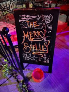 Chalkboard sign that says The Merry Shelley